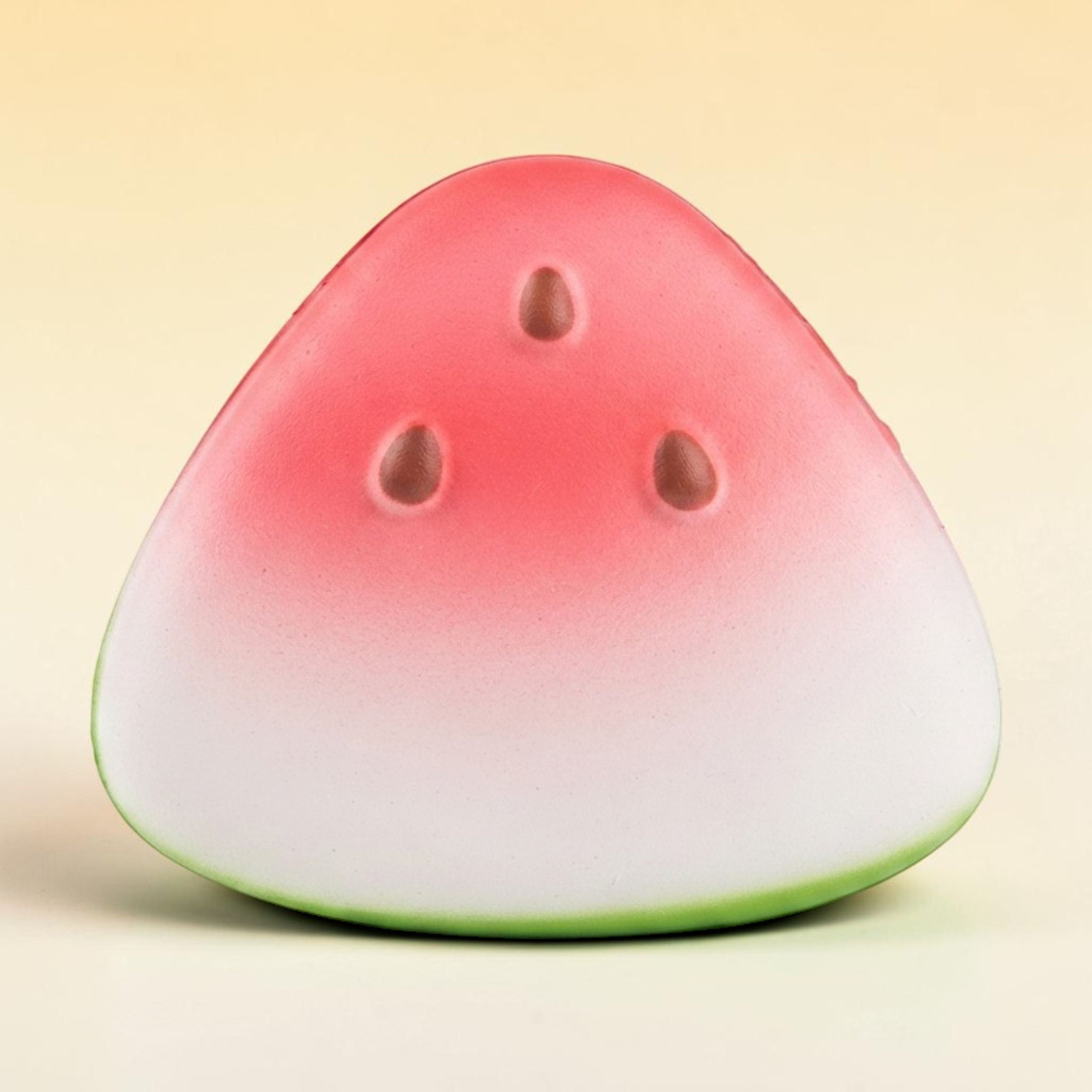 Watermelon slice squishy front view showing pink flesh gradient and green rind