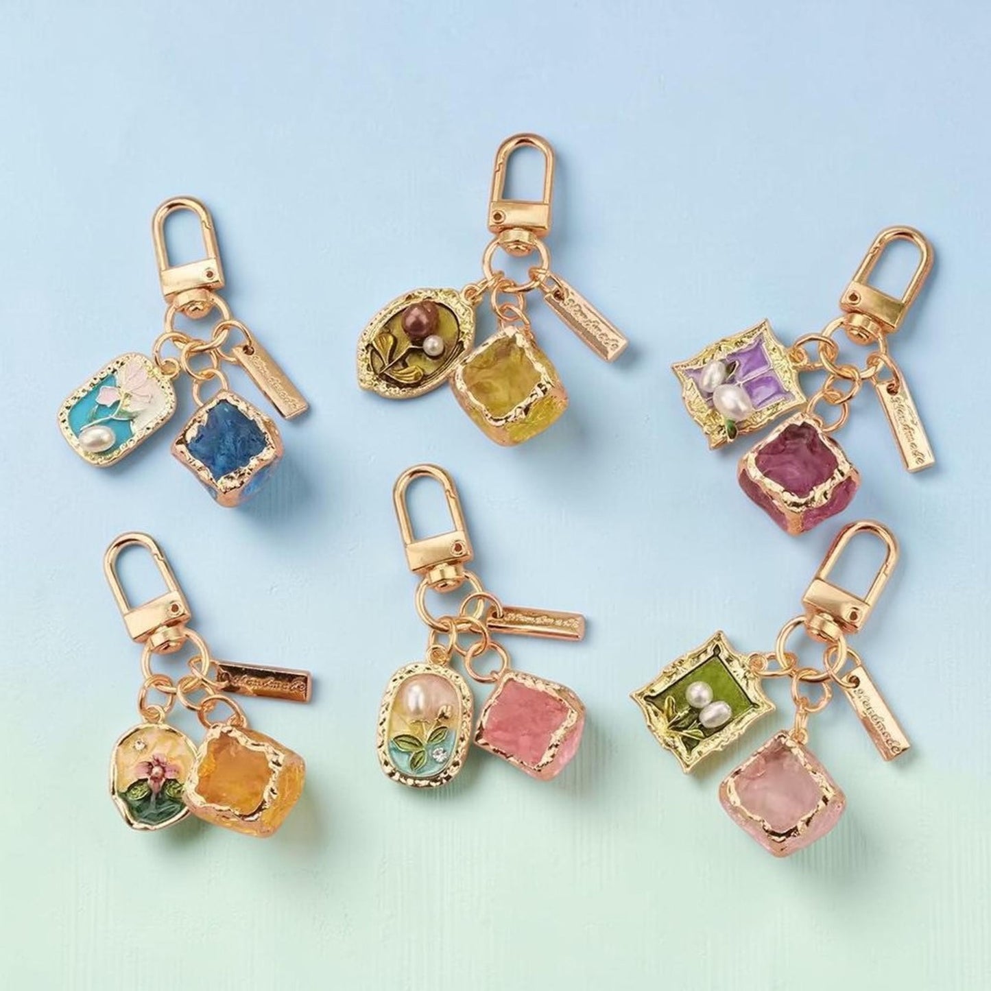 Amber and floral enamel charm keychain with rose-gold hardware