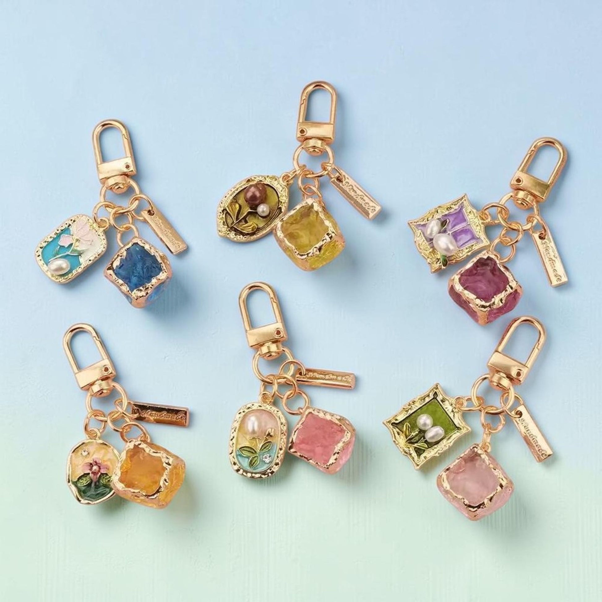 Amber and floral enamel charm keychain with rose-gold hardware