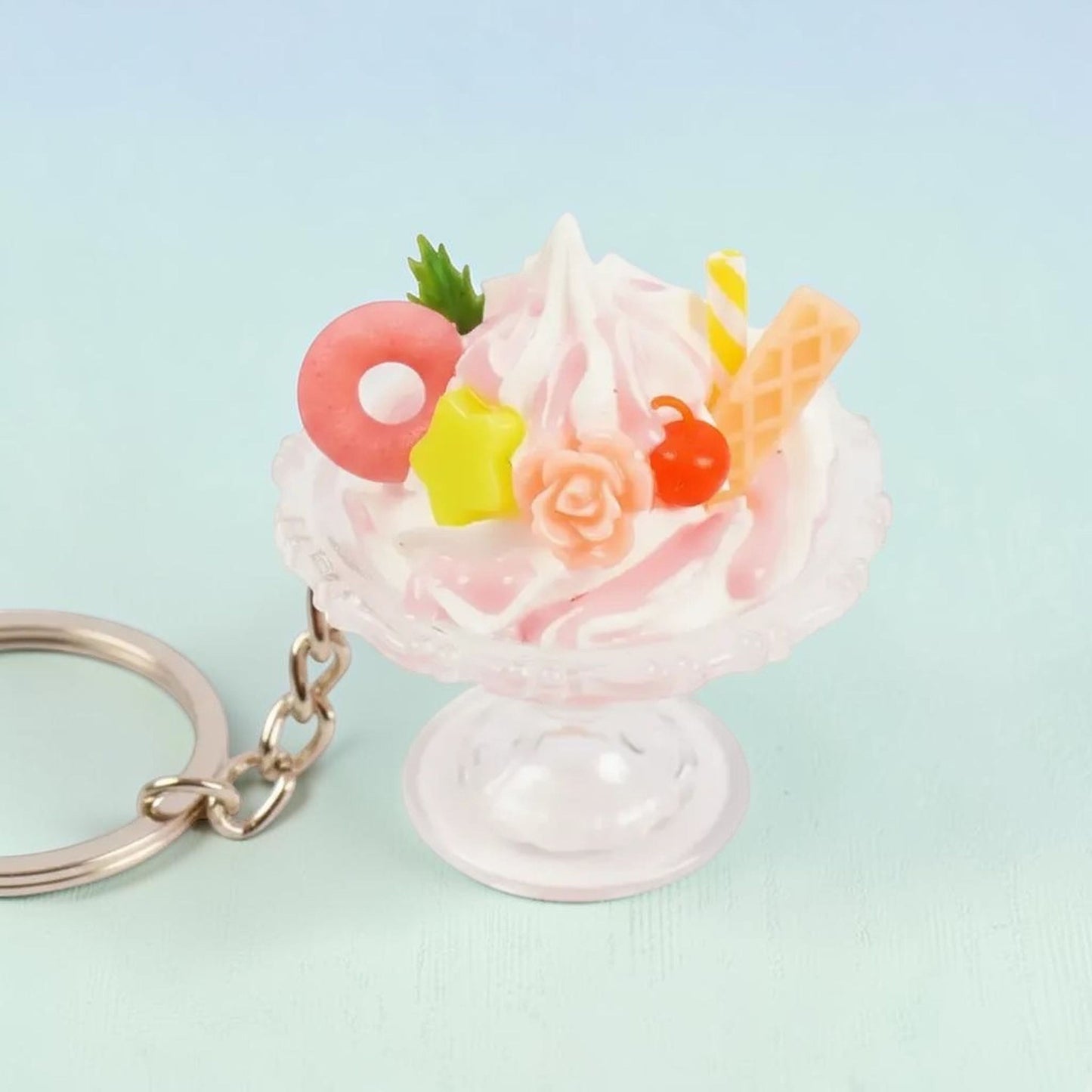 Kawaii chocolate bear ice cream sundae keychain with daisy flowers and strawberry