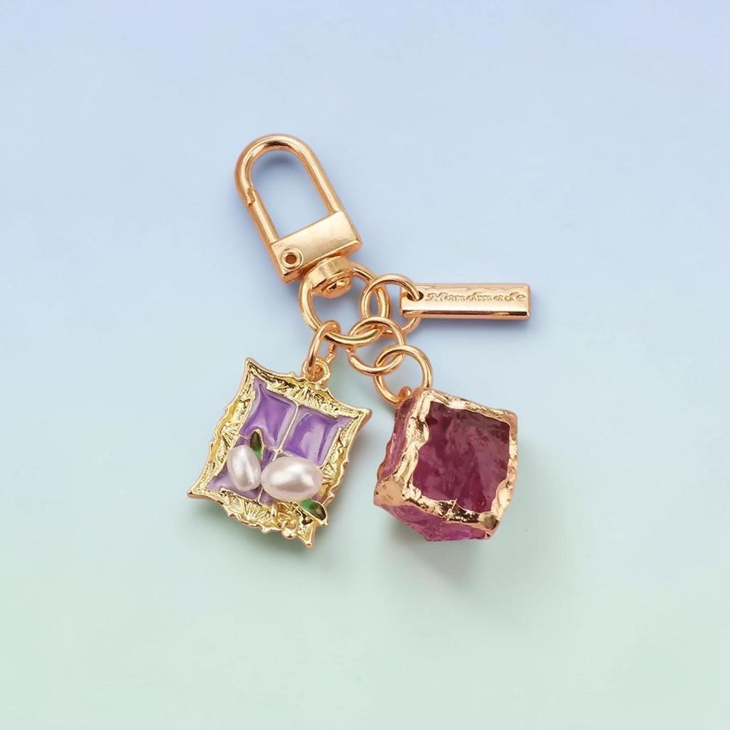 Size reference photo showing keychain approximately 7cm total length