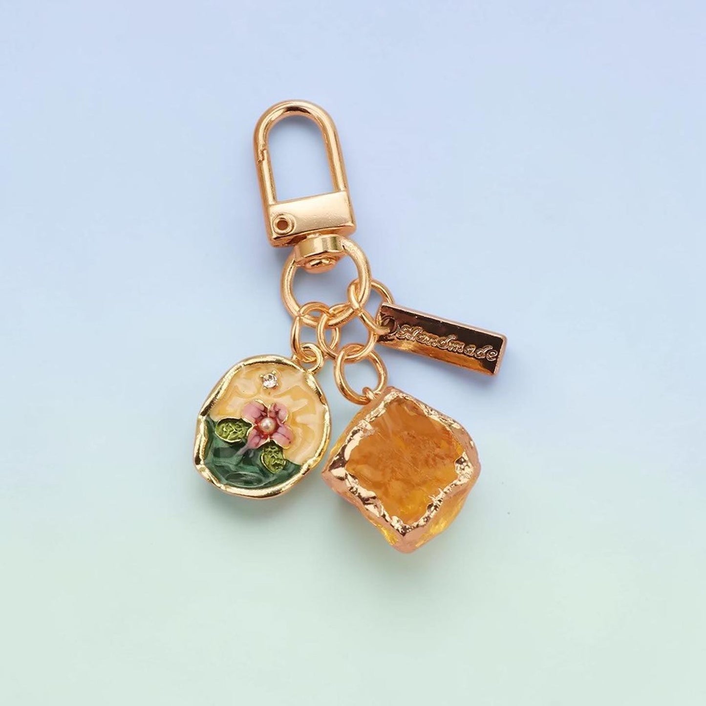 Botanical enamel charm keychain detail view