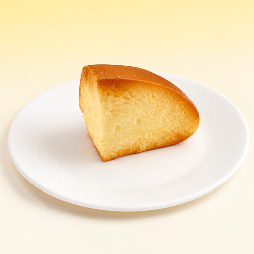 Bread slice squishy on white plate with yellow background